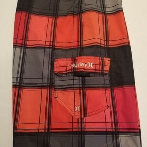 Hurley boardshorts.     Size.34, Red/Black checkerboard theme.